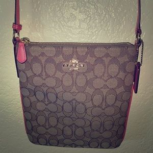 COACH crossbody monogram bag.
